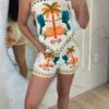 conjunto flora laranja com tucano